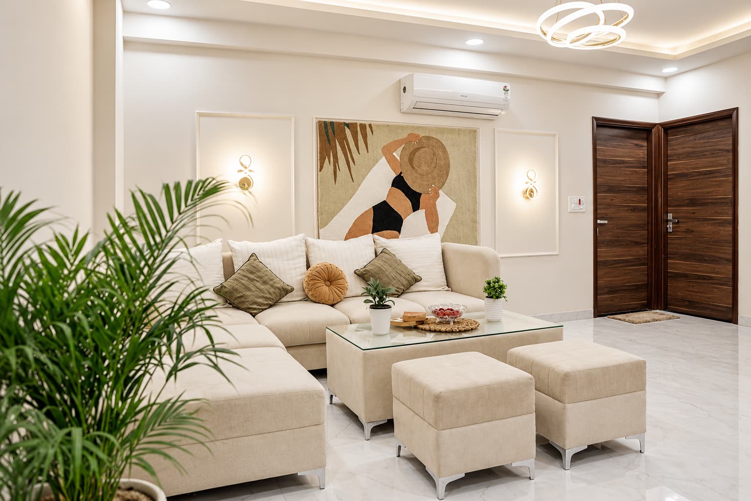 Sunlit living room with cream sofas